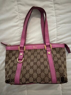 Authentic Gucci Brown GG Canvas Shoulder Bag with Pink Trim